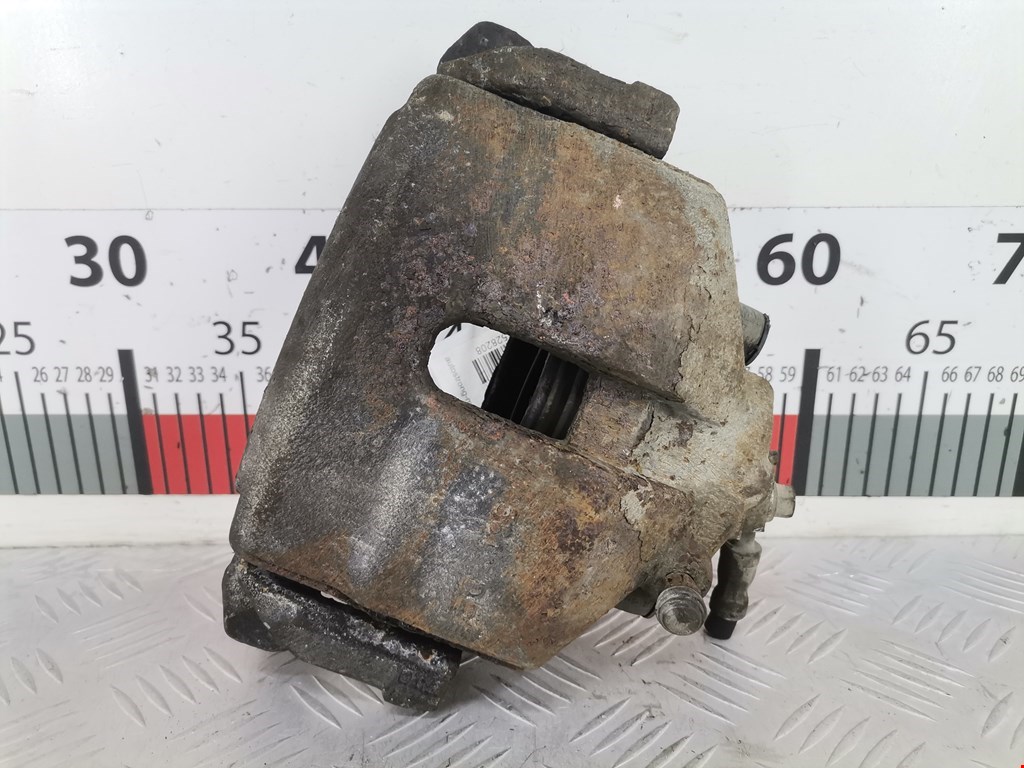 Суппорт тормозной передний левый